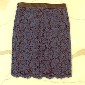 Blue lace pencil skirt with leather top hem